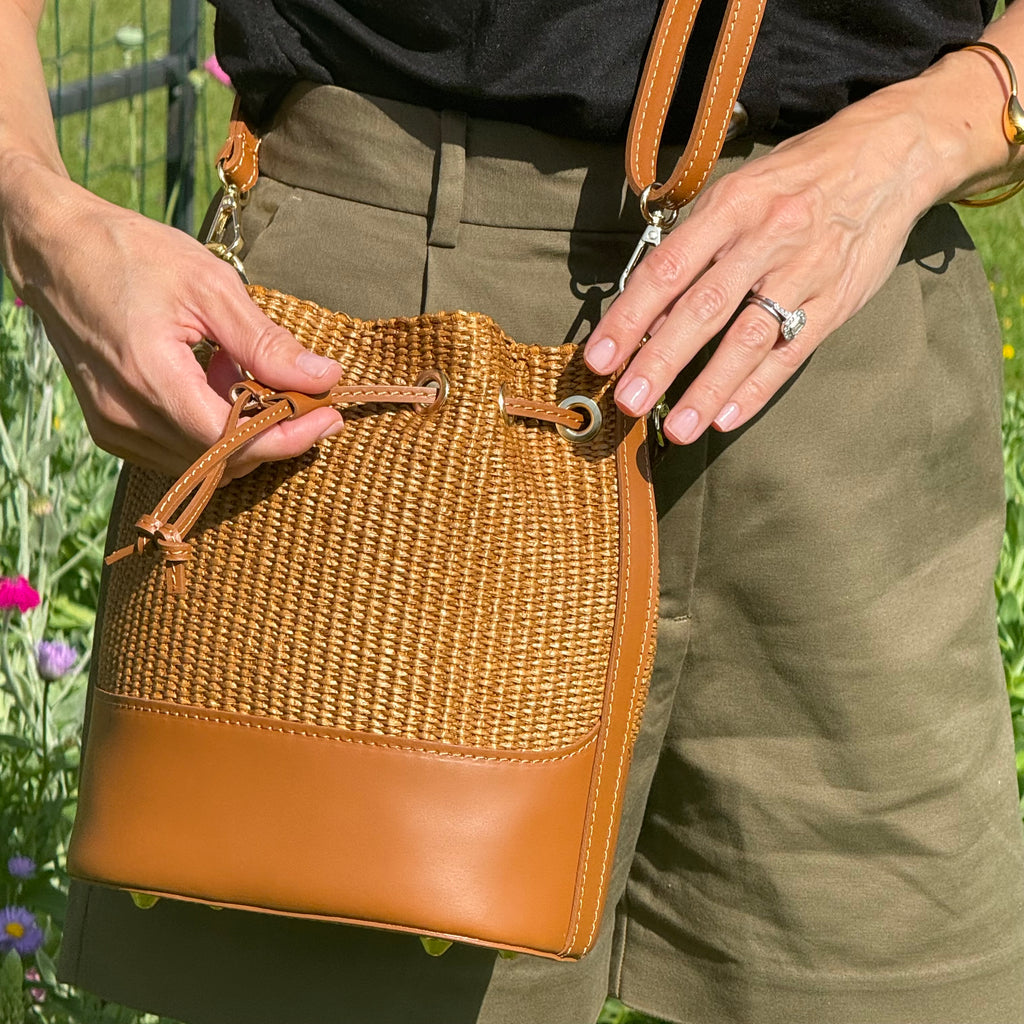Close-up of woven Italian leather texture on handbag	 	 
 	